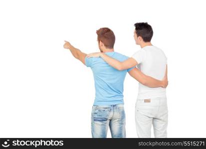 Couple of best friends pointing something on a white background