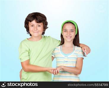 Couple of children isolated on blue background