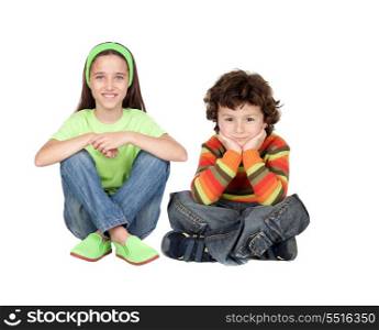 Couple of children sitting on a white background