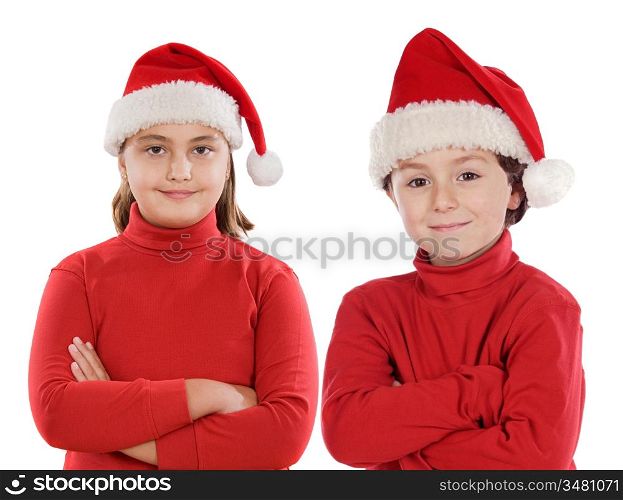 Couple of children with hat of Christmas isolated over white