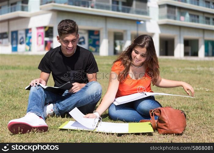 Couple of happy students at the university campus