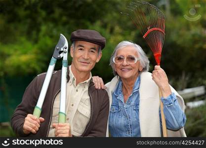 couple of pensioners gardening
