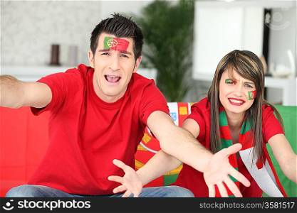 Couple of Portuguese soccer supporters