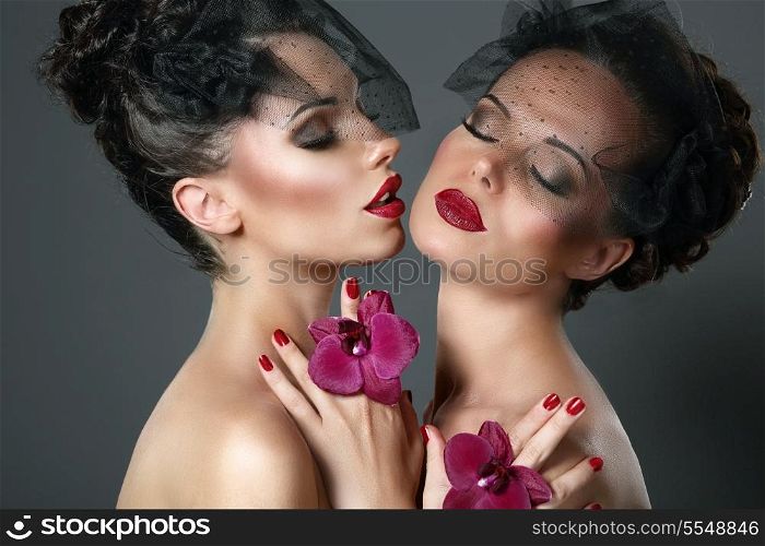Couple of Tempting Passionate Women with Flowers Flirting