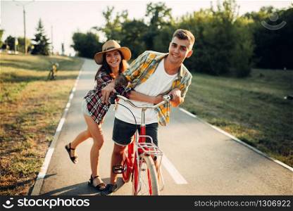 Couple of tourists looking for city attractions, excursion in town. Summer hiking. Hike adventure of young man and woman