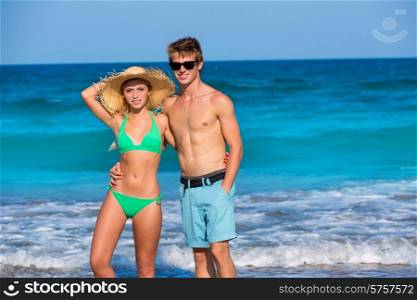 Couple of young tourists in a tropical summer beach
