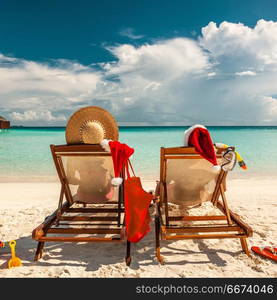 Couple on a beach at christmas. Couple on a tropical beach in Maldives at christmas