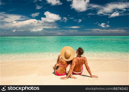 Couple on a beach at Maldives. Couple on a tropical beach at Maldives