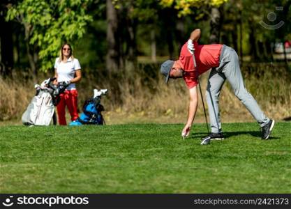 Couple on a golfing vacation, beautiful sunny weather