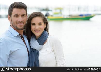 couple on a port posing