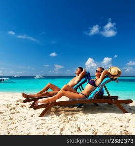 Couple on a tropical beach at Maldives