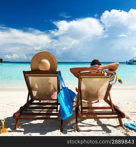 Couple on a tropical beach at Maldives