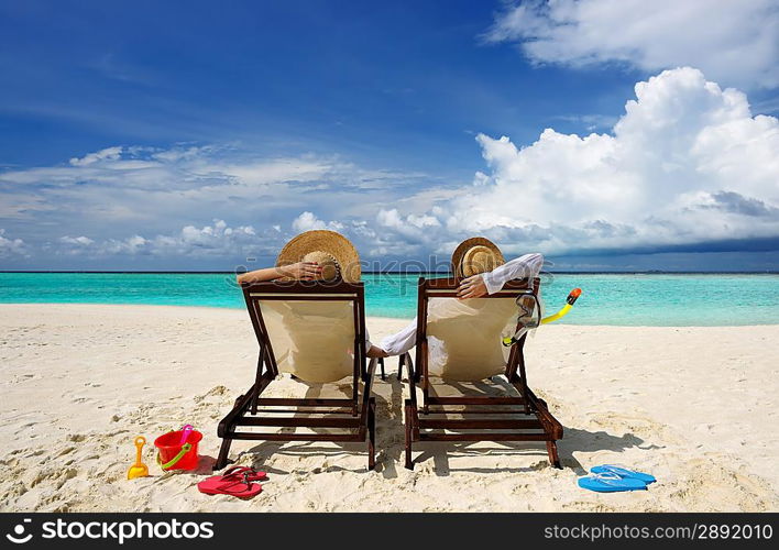 Couple on a tropical beach at Maldives