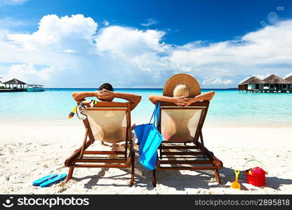 Couple on a tropical beach at Maldives