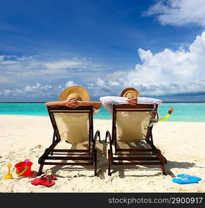 Couple on a tropical beach at Maldives