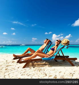 Couple on a tropical beach at Maldives