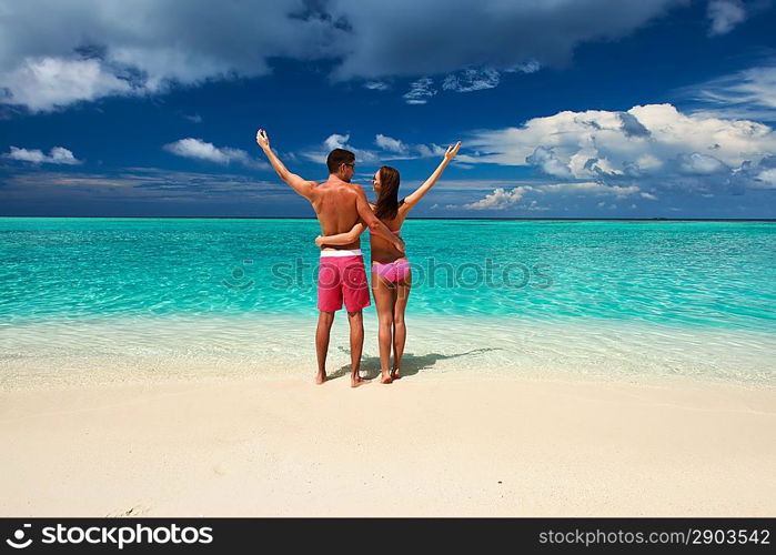 Couple on a tropical beach at Maldives