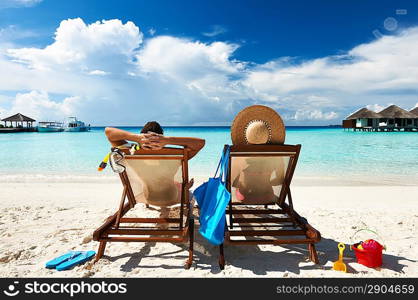 Couple on a tropical beach at Maldives