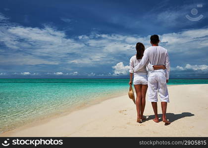 Couple on a tropical beach at Maldives