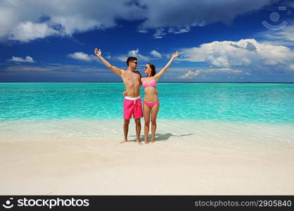 Couple on a tropical beach at Maldives