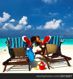 Couple on a tropical beach at Maldives