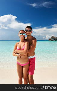 Couple on a tropical beach at Maldives