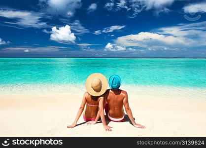 Couple on a tropical beach at Maldives