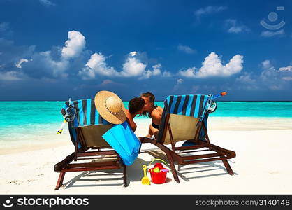 Couple on a tropical beach at Maldives