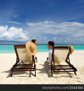 Couple on a tropical beach at Maldives