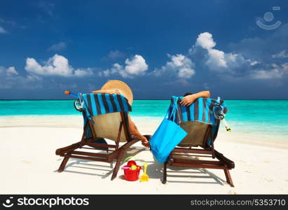 Couple on a tropical beach at Maldives