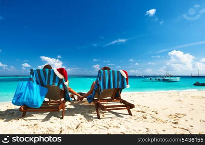 Couple on a tropical beach at Maldives