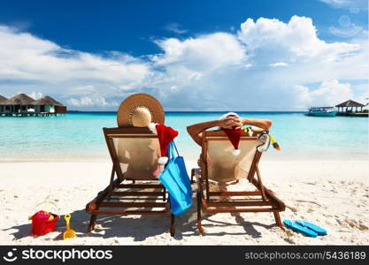 Couple on a tropical beach at Maldives