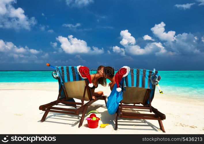 Couple on a tropical beach at Maldives