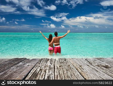 Couple on a tropical beach at Maldives