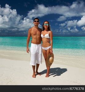 Couple on a tropical beach at Maldives