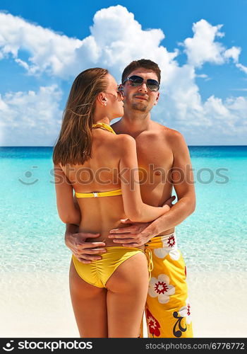 Couple on a tropical beach at Maldives