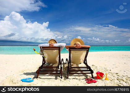 Couple on a tropical beach at Maldives