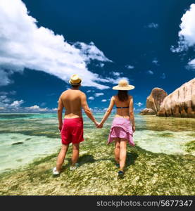 Couple on a tropical beach at Seychelles