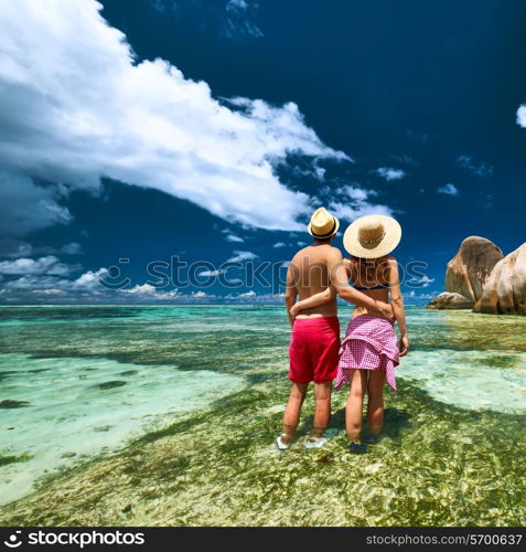 Couple on a tropical beach at Seychelles