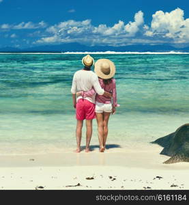 Couple on a tropical beach at Seychelles