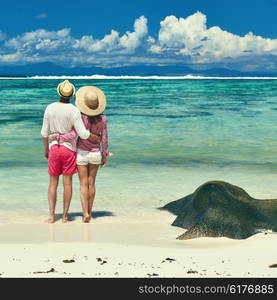 Couple on a tropical beach at Seychelles