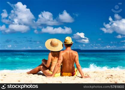 Couple on a tropical beach at Seychelles, La Digue