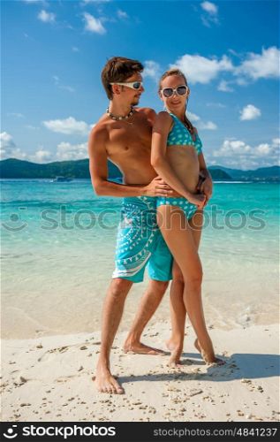 Couple on a tropical beach at Thailand