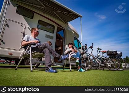 Couple on holiday at a campsite. Caravan car Vacation. Family vacation travel, holiday trip in motorhome