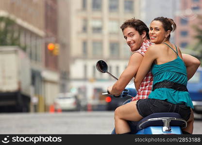 Couple on Motor Scooter