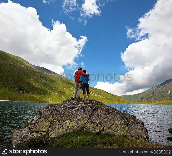 Couple on mountains lake