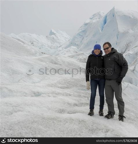 Couple on Perito Moreno Glacier, Los Glaciares National Park, Santa Cruz Province, Patagonia, Argentina