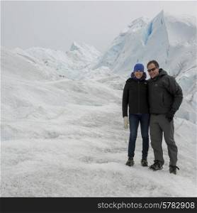 Couple on Perito Moreno Glacier, Los Glaciares National Park, Santa Cruz Province, Patagonia, Argentina