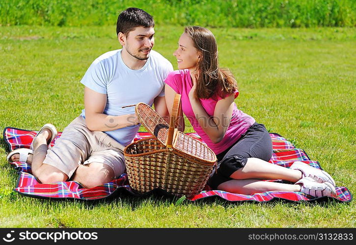 Couple on picnic at sunny day