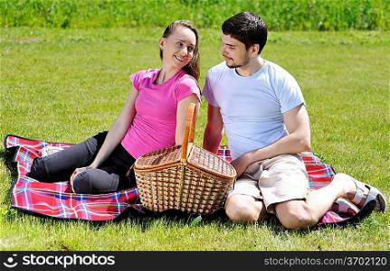 Couple on picnic at sunny day